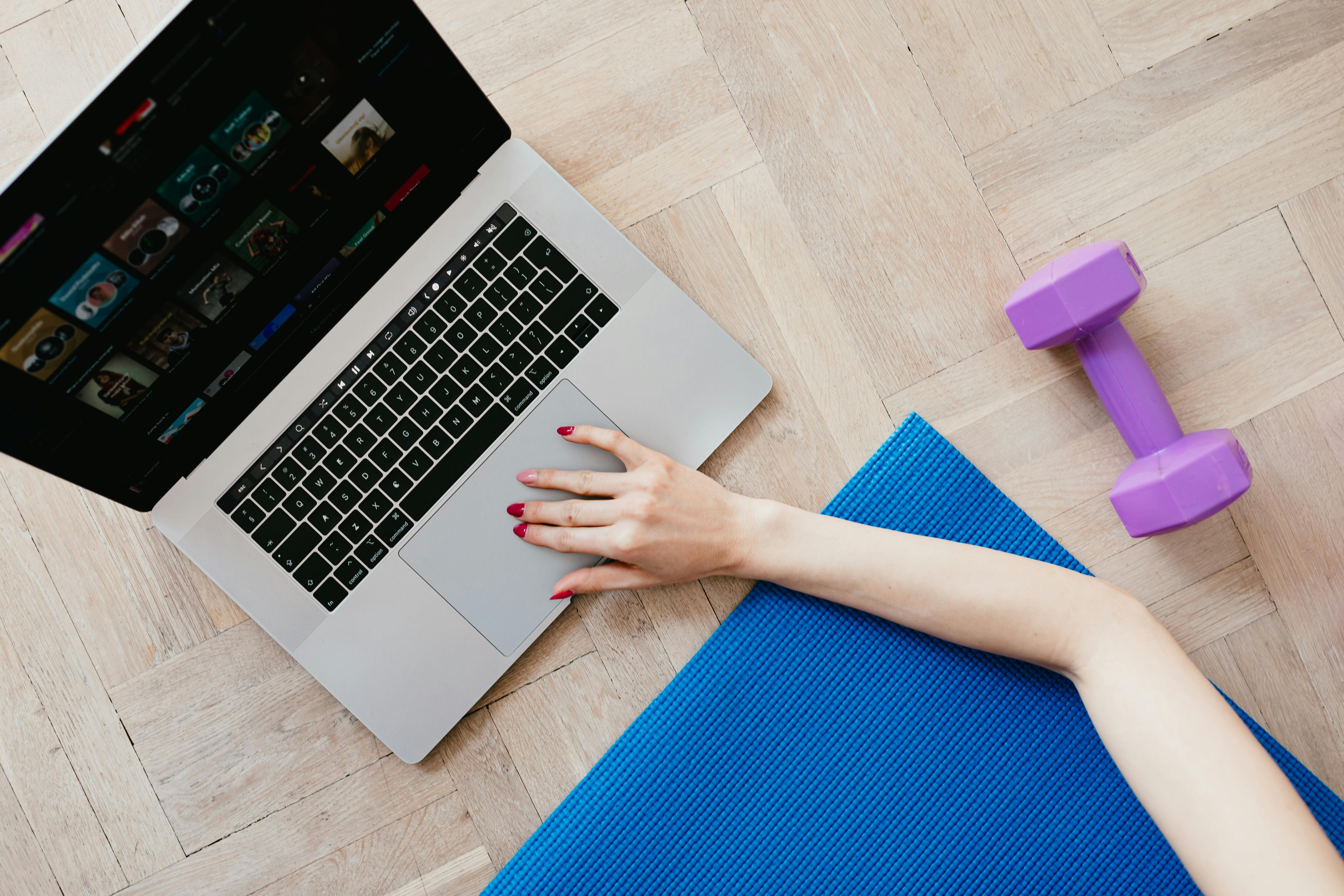 Person performing a combination of HIIT and yoga exercises
