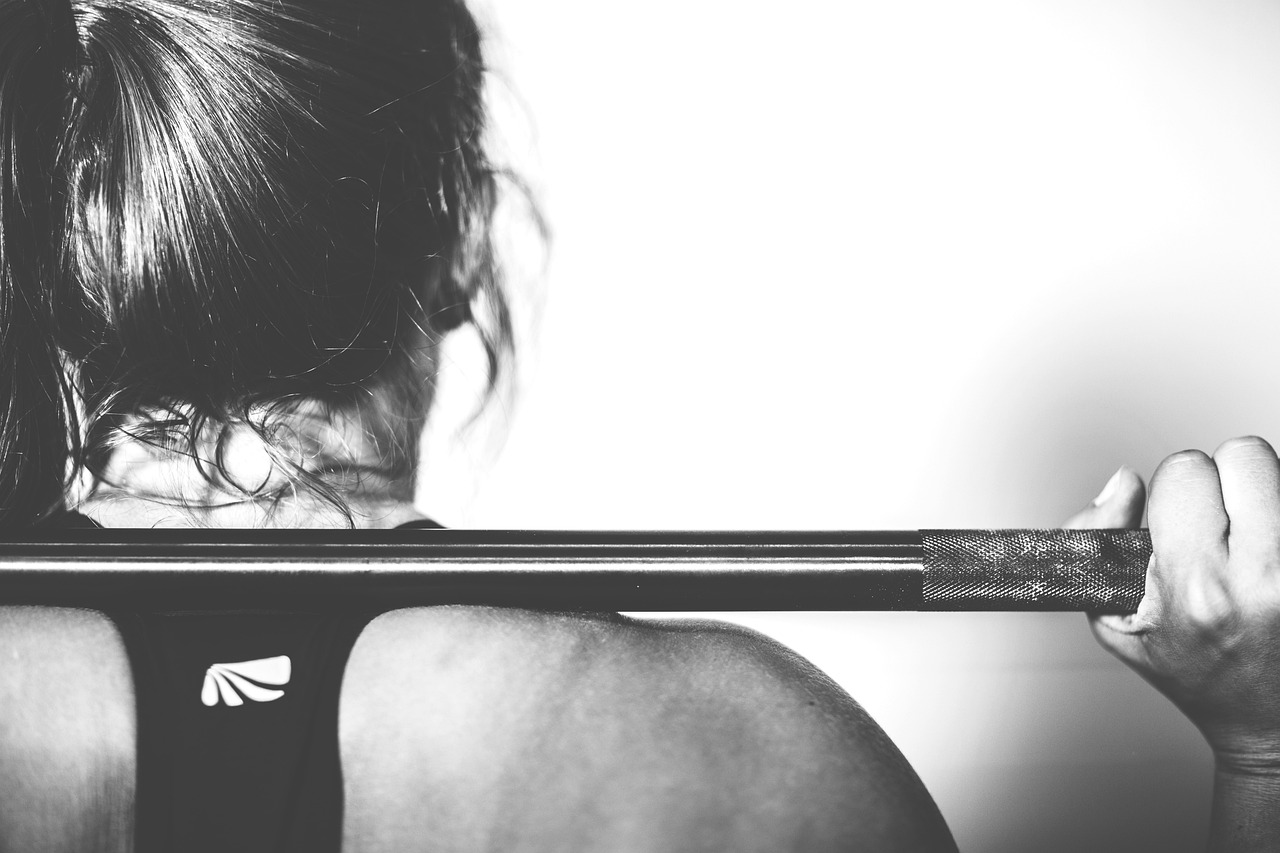 Person starting HIIT workout with proper form and guidance