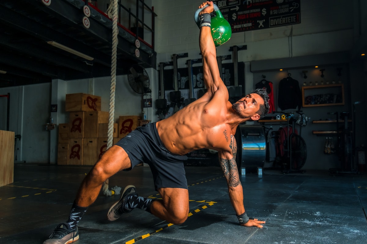 Person correcting form during a HIIT workout